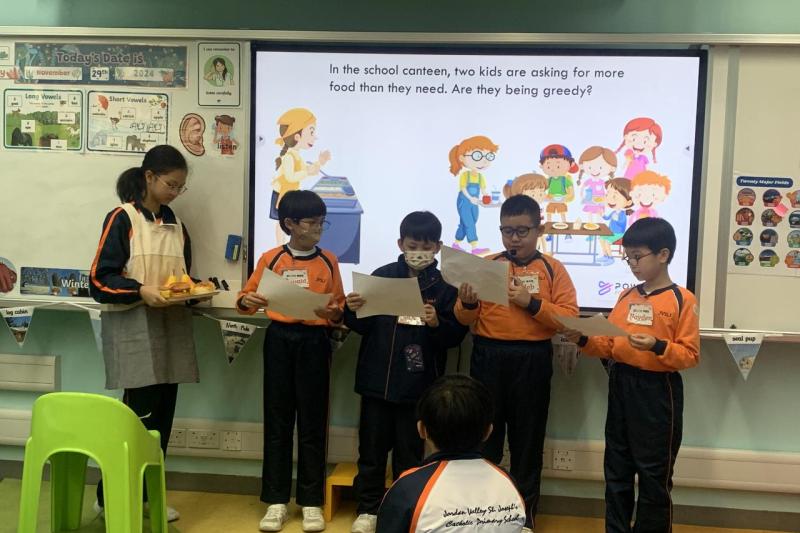 Students perform a drama.